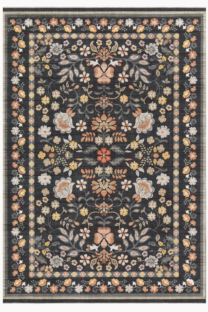 Vue de dessus du tapis bohème à fleurs vintage "Soline" en couleur Noir Coucher de Soleil.